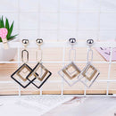 Geometric temperament earrings