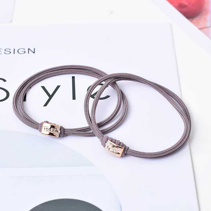 A Ruyi finger buckle Rings Hair Bands  with a Jian design in a variety of colors